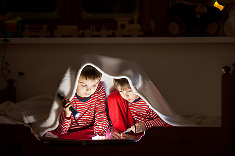 kids with flashlights during a winter storm
