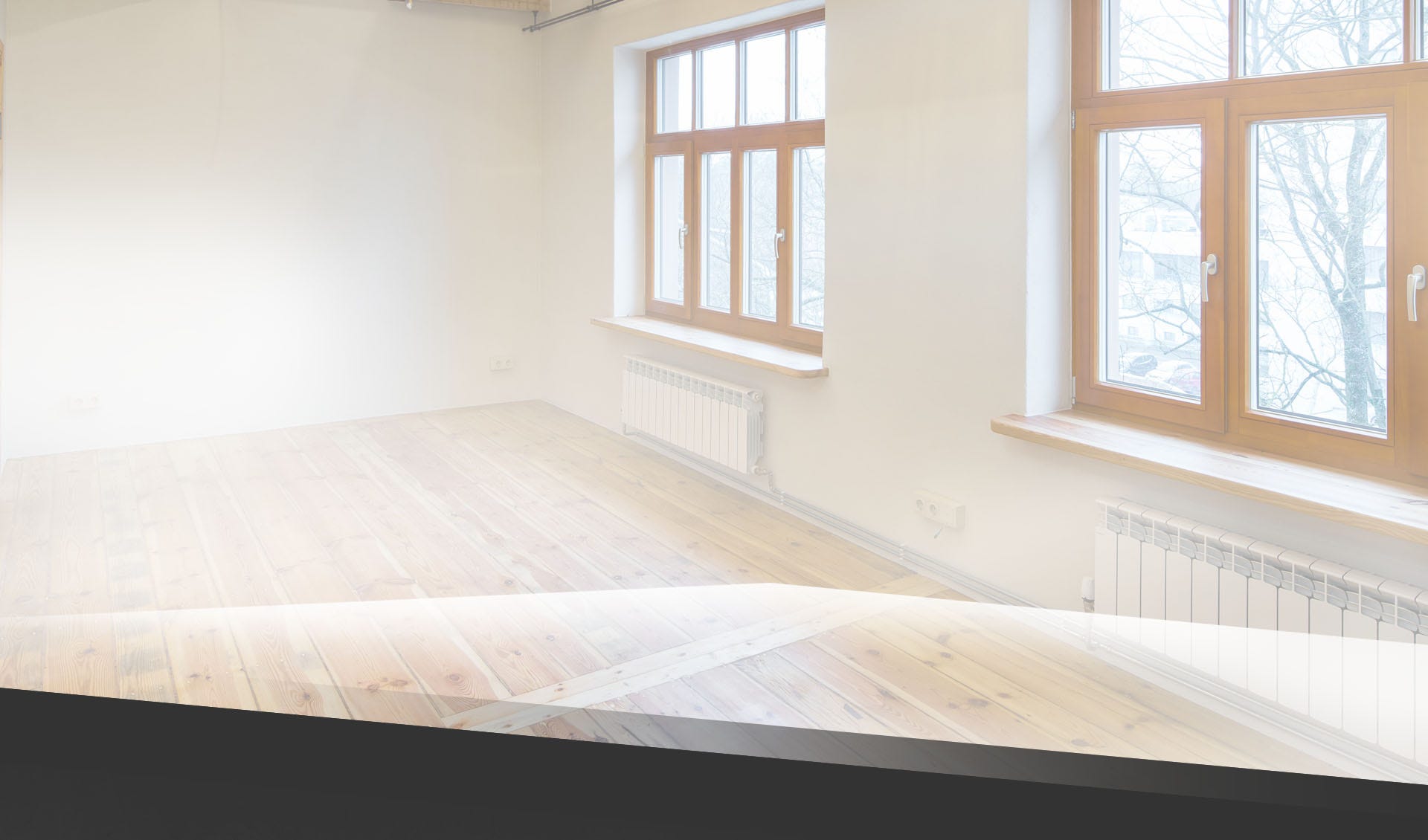 Empty room with large windows