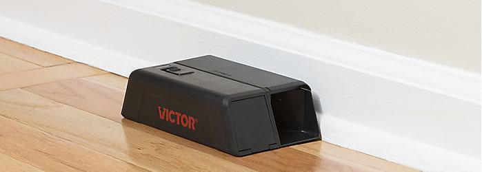 Victor Electronic Mouse Trap placed lengthwise against a wall