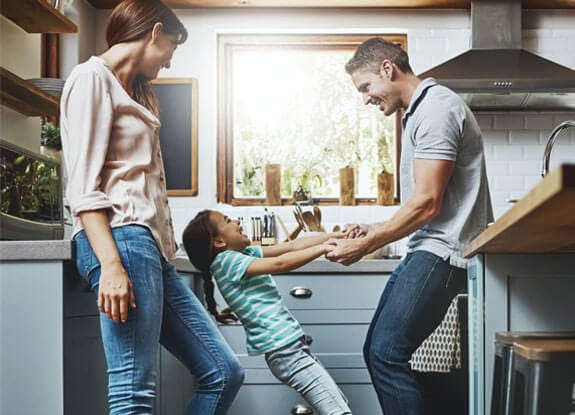 A family in their kitchen